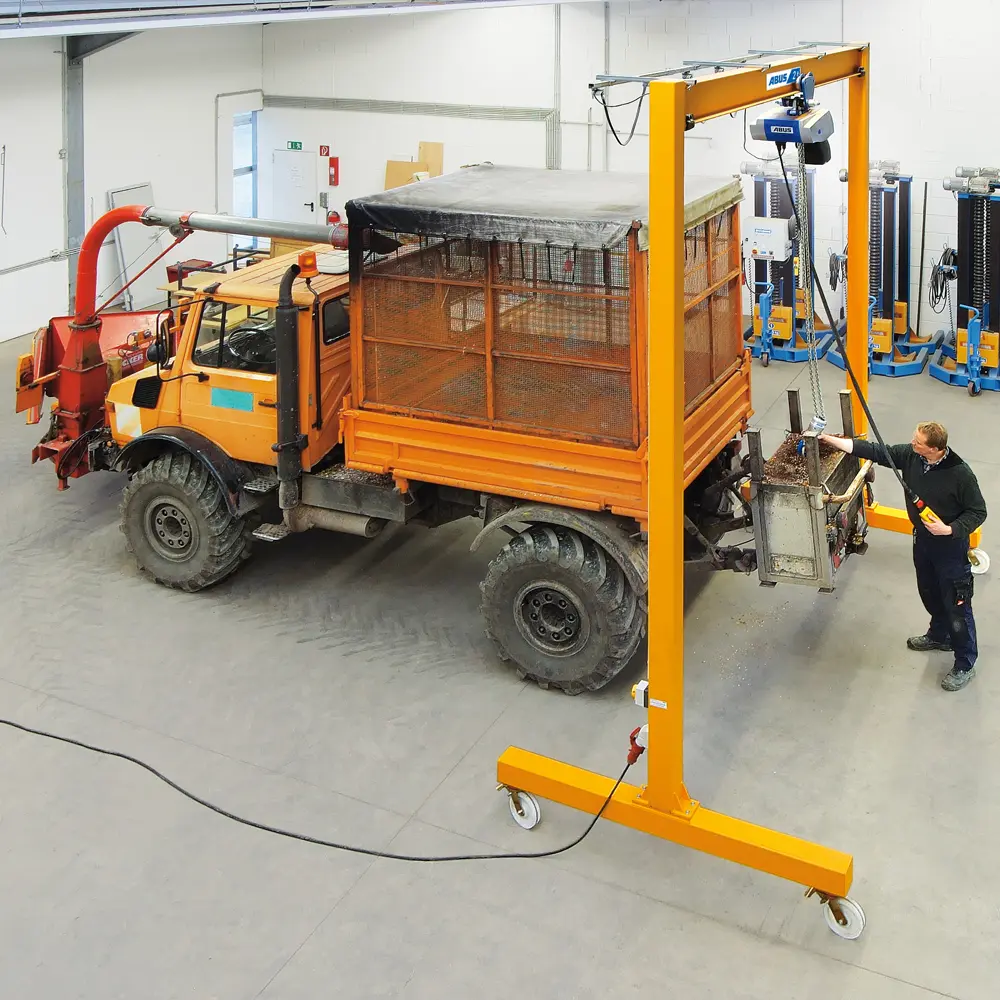 5. Produktbild zu tigerhebezeuge-abus-stahl-portalkran-mit-elektrokettenzug-und-elektro-fahrwerk-bockkran-serie-LPK-EKZ-EFW-einsatz1